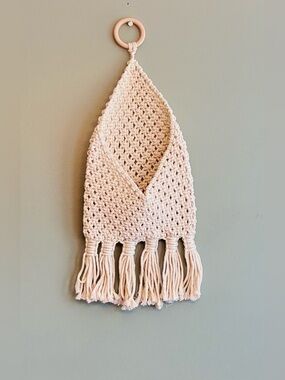 Handmade vintage macrame wall pocket.